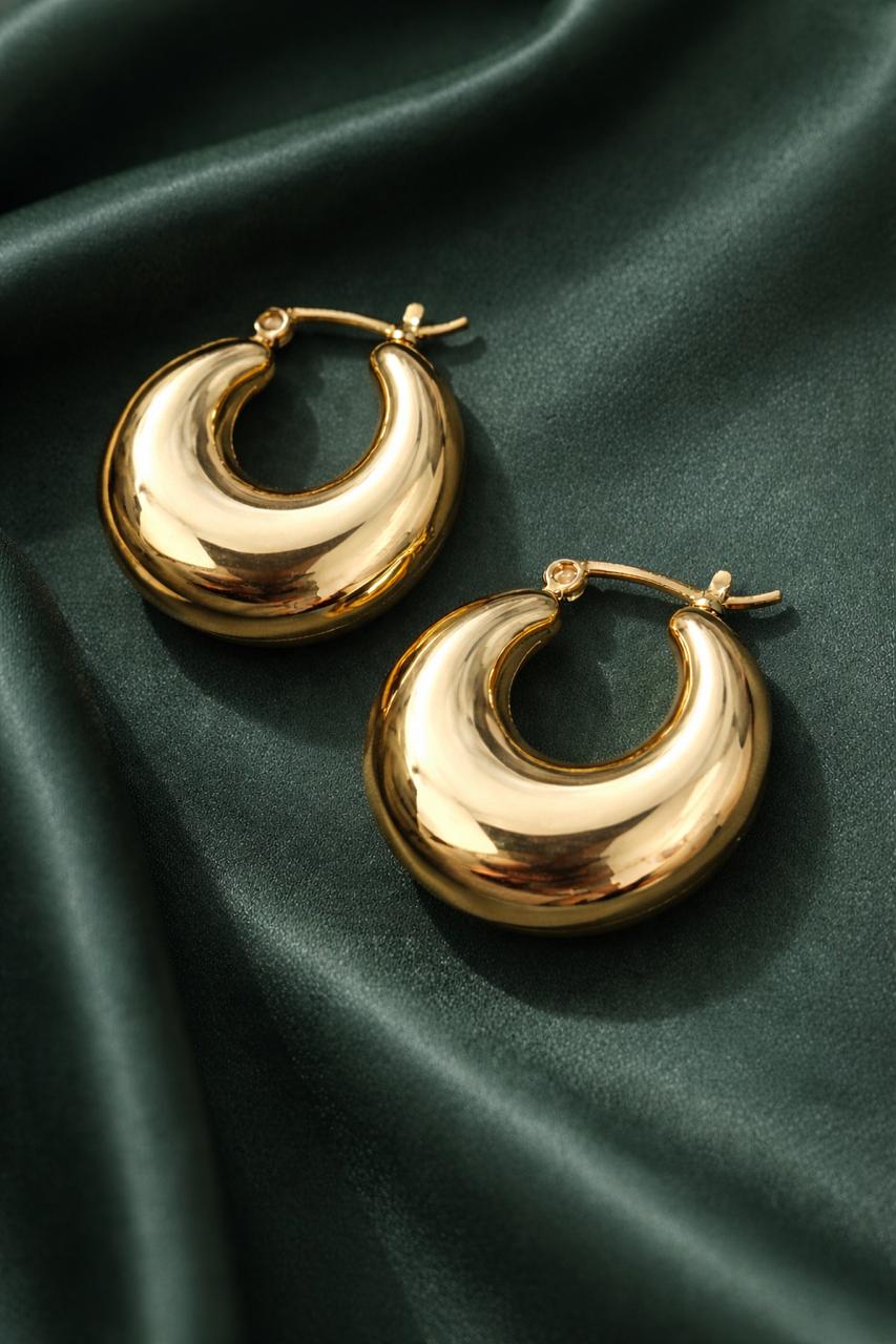 Anti-Tarnish, Ashaarya, Ashaarya Jewels, Ashaarya Jewellery, Gold hoop earrings on a green fabric background