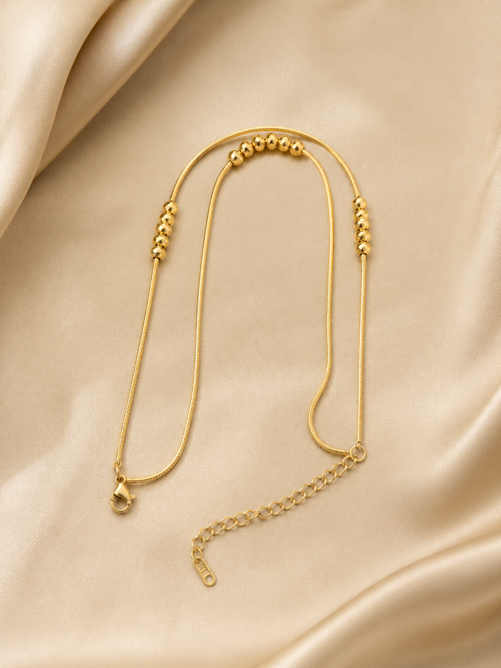 anti-tarnish comfort jewellery anklet close up showing smooth polished beads and snake chain, irritation-free minimal anklet for women