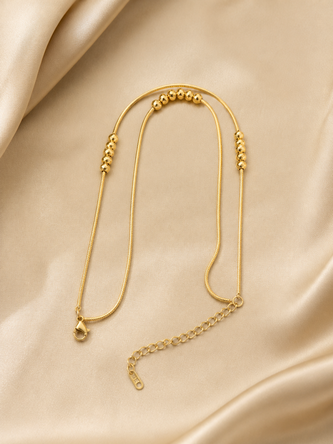 anti-tarnish comfort jewellery anklet close up showing smooth polished beads and snake chain, irritation-free minimal anklet for women