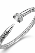 Anti-tarnish nail bracelet for women from Ashaarya comfort jewellery collection featuring twisted nail design with American diamonds.
