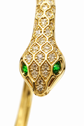 Anti-tarnish snake bracelet for women featuring textured serpent scales and green stone eyes from Ashaarya comfort jewellery collection.