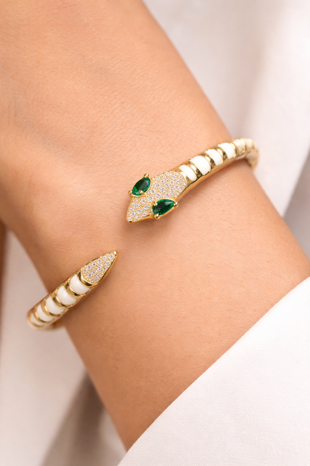 Woman wearing anti-tarnish 18KT gold tone snake bracelet – luxury comfort jewellery for women by Ashaarya