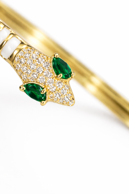 Close-up of diamond studded snake head bracelet with emerald stone eyes – anti-tarnish comfort jewellery
