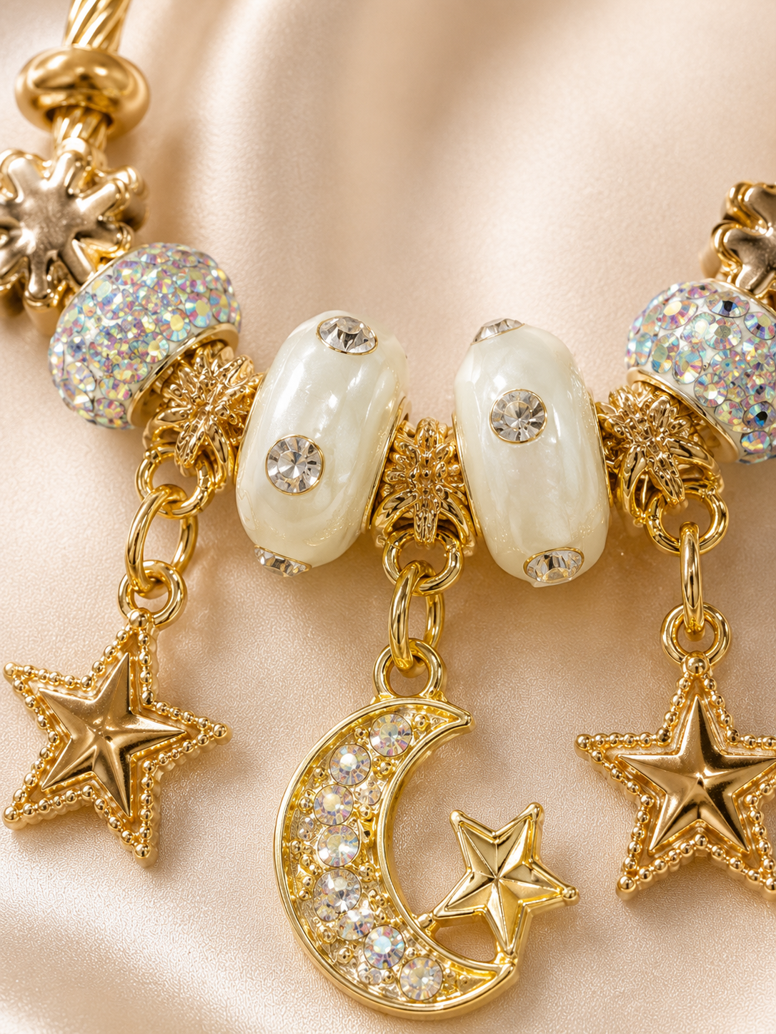 Anti-tarnish Chaandni Raat celestial charm bracelet with moon and star charms in 18kt gold tone by Ashaarya