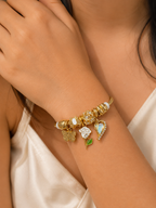 gold charm bracelet, charm bracelet for women, anti tarnish bracelet, lightweight bracelet, 316L stainless steel jewellery, gold cuff bracelet, butterfly charm bracelet, floral charm bracelet, heart charm bracelet, everyday jewellery, comfort jewellery, luxury bracelet, gift for women, demi-fine jewellery, Ashaarya
