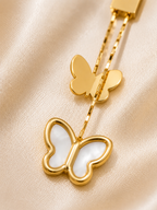 butterfly earrings, drop earrings, dangler earrings, 18kt gold tone, anti tarnish jewellery, stainless steel earrings, lightweight earrings, hypoallergenic earrings, mother of pearl, butterfly jewellery, everyday luxury, elegant earrings, premium jewellery, comfort jewellery, Ashaarya