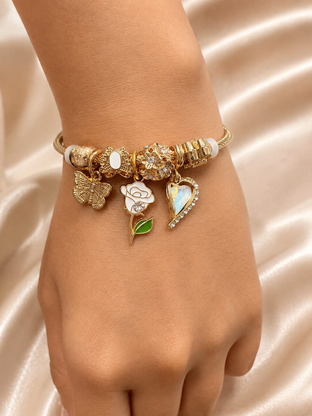 gold charm bracelet, charm bracelet for women, anti tarnish bracelet, lightweight bracelet, 316L stainless steel jewellery, gold cuff bracelet, butterfly charm bracelet, floral charm bracelet, heart charm bracelet, everyday jewellery, comfort jewellery, luxury bracelet, gift for women, demi-fine jewellery, Ashaarya