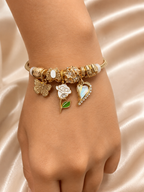 gold charm bracelet, charm bracelet for women, anti tarnish bracelet, lightweight bracelet, 316L stainless steel jewellery, gold cuff bracelet, butterfly charm bracelet, floral charm bracelet, heart charm bracelet, everyday jewellery, comfort jewellery, luxury bracelet, gift for women, demi-fine jewellery, Ashaarya