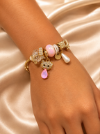 cat charm bracelet, cute charm bracelet, gold charm bracelet for women, anti tarnish charm bracelet, 316L stainless steel bracelet, lightweight bracelet, pink charm bracelet, comfort jewellery, Ashaarya charm bracelet